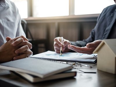 Two people discussing mortgages