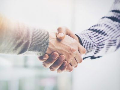 Two people shaking hands